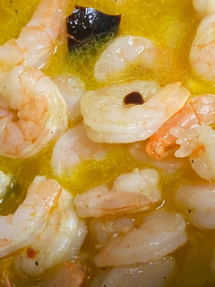 Una foto de Camarones al pil pil