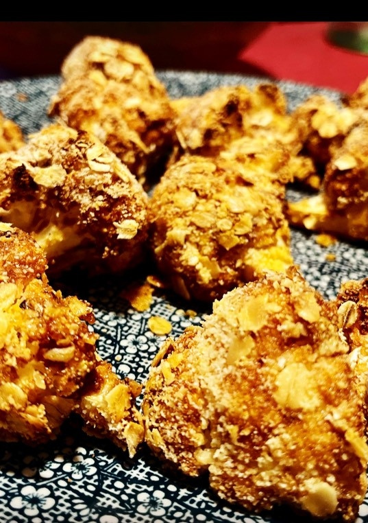 Una foto de Alitas de coliflor con salsa barbacoa 🍗