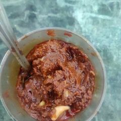 A picture of Tasty tomato and tamarind pickle.