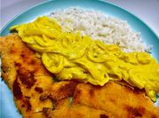 Una foto de pollo curry
