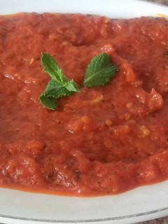 Foto principal de Como hacer salsa casera de tomate para cualquier pizza casera
