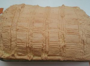 Una foto de Budín de pan de caja
