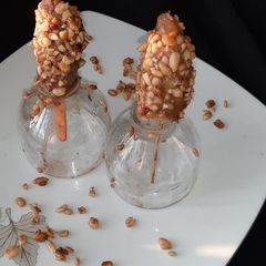 A picture of Peanut coated Banana Lolly.