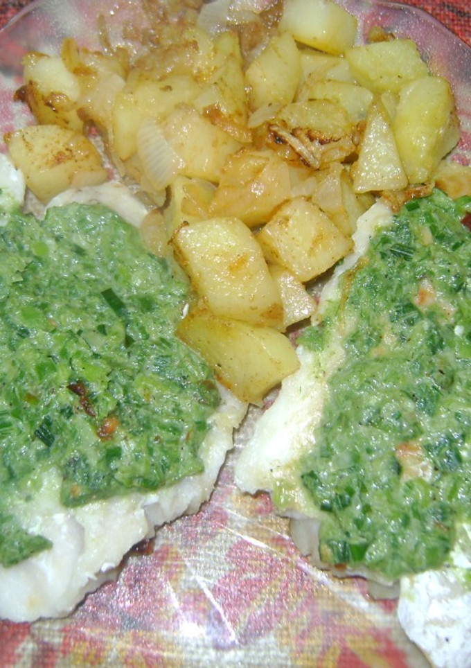 Una foto de Merluza con salsa de puerros