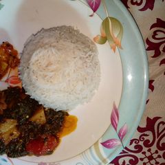 Simple palak chawal With achaar shikarpuri A picture of Simple palak chawal With achaar shikarpuri.