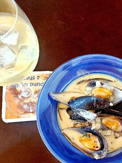 A picture of Mussels in a Creamy White Wine sauce.