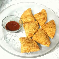 A picture of Striped Veggie Samosa.