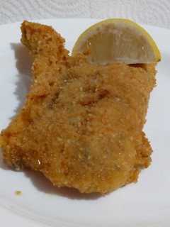 Una foto de Fitet de Abadejo con hierbas de Provance en milanesa