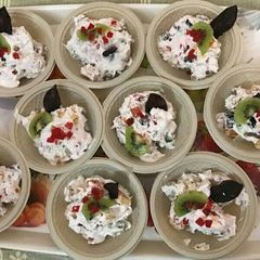 A picture of Fruit cream with chocolate leaves.
