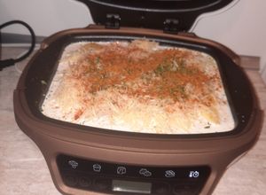 Une photo de Gratin de pomme de terre maison et allumette de poulet halal aux cake factorie