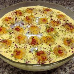 A picture of Mango & Pomegranate Kalakand With Stuffed Lychee.