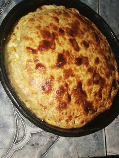 Una foto de Tarta de jamón y queso, huevo, tomate