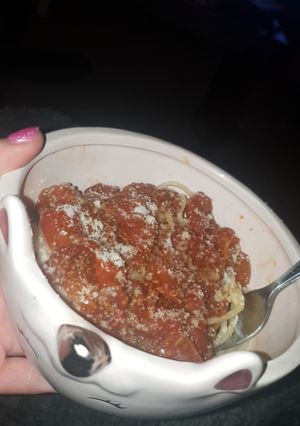 A picture of Slow Cooker Balsamic Tomatoes with spaghetti.