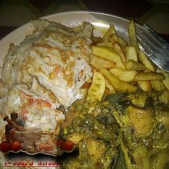 A picture of Chips and egg with Cat Fish pepper soup.