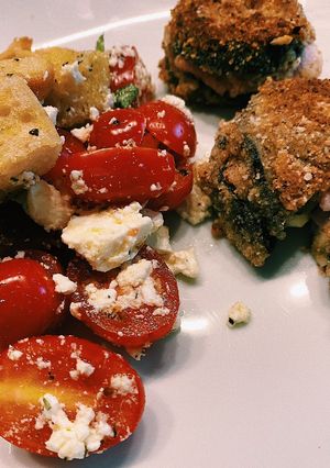A picture of Eggplant cordon bleu with tomato and bread salad 🥗.