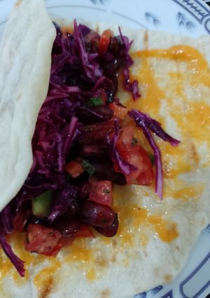Una foto de Tacos de porotos rojos