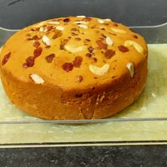 A picture of Eggless Wheat cake in cooker.