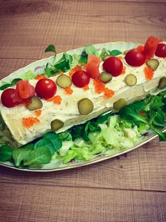Una foto de Tronco de Navidad salado con salmón ahumado