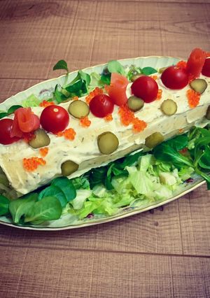 Una foto de Tronco de Navidad salado con salmón ahumado