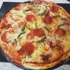 A picture of My Over Loaded Pizza 😘.