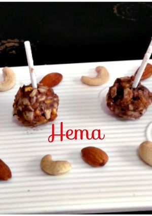 A picture of Dry fruits ganache chocolate lollipop.