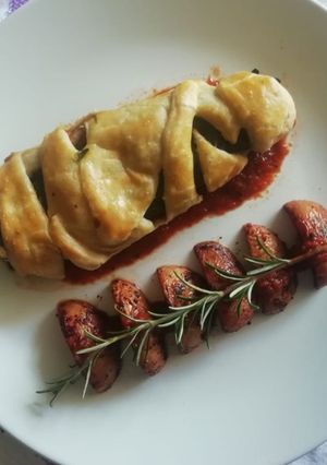 Una foto de Rollo de chile poblano hojaldrado