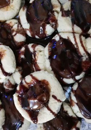 Una foto de Galletita estilo pepas de dulce de leche 😋😋😋
