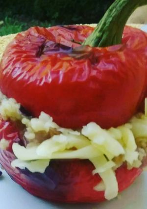 A picture of Couscous filled red bell peppers.