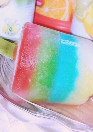 A picture of Rainbow Popsicles.