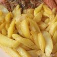 Fried Irish pototos with onion and fish sauce