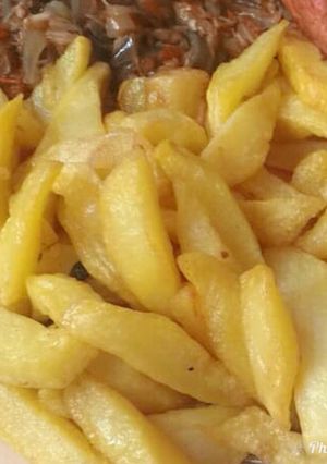 A picture of Fried Irish pototos with onion and fish sauce.