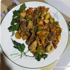 A picture of Gizdodo with celery and chicken fillet.