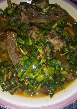 A picture of Scent leaf, and Water leaf soup.