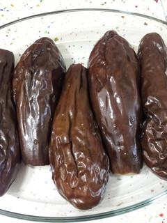 Una foto de Berenjenas y pimientos en papillot