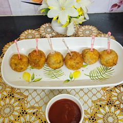 A picture of Restaurant style corn cheese crispy balls.