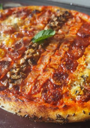 Une photo de Pizza