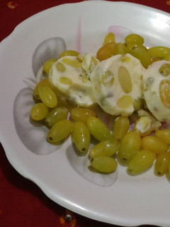 A picture of Grapes and curd kulfi.