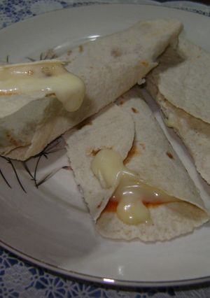 Una foto de Tacos tipo pizza