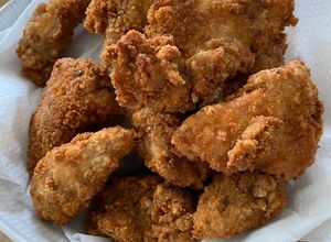 Foto di Pollo fritto ai 3 pepi e grani di mostarda