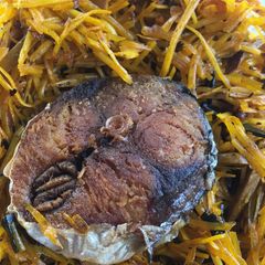 A picture of Abacha and fried fish.