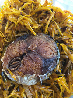 A picture of Abacha and fried fish.