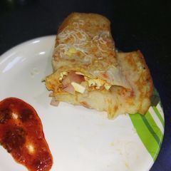 A picture of Paneer shezwan chilla.