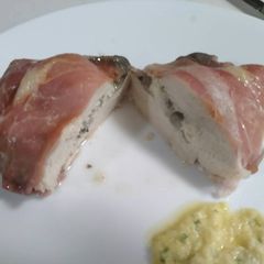A picture of Feta Stuffed Prosciutto wrapped Chicken Breasts.