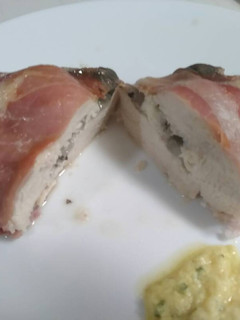 A picture of Feta Stuffed Prosciutto wrapped Chicken Breasts.