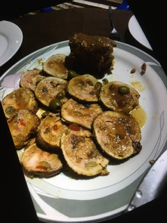 Una foto de Lomo de cerdo relleno con 3 carnes