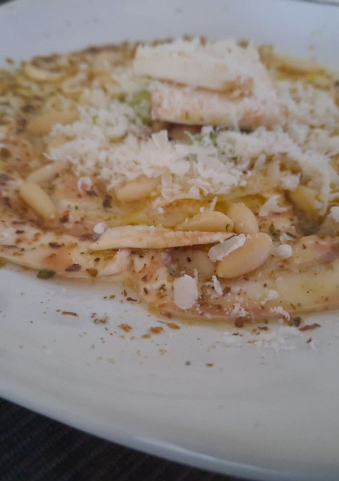Una foto de Carpaccio de champiñones