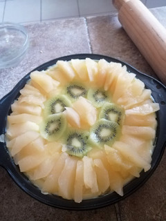 Una foto de Tartaleta manzana y kiwi
