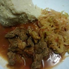 A picture of Beef Stew Cabbage and Ugali.