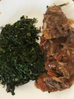 A picture of Beef stew with veggies.