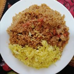 A picture of Pilau and cabbage.